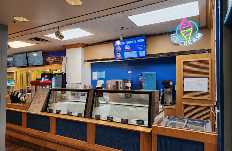 Chapman’s ice cream freezer at Foggy City Sweets and Souvenirs featuring 16 flavours and colourful signage.