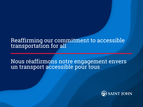 A person using a mobility aid activates an Accessible Pedestrian System at a crosswalk.