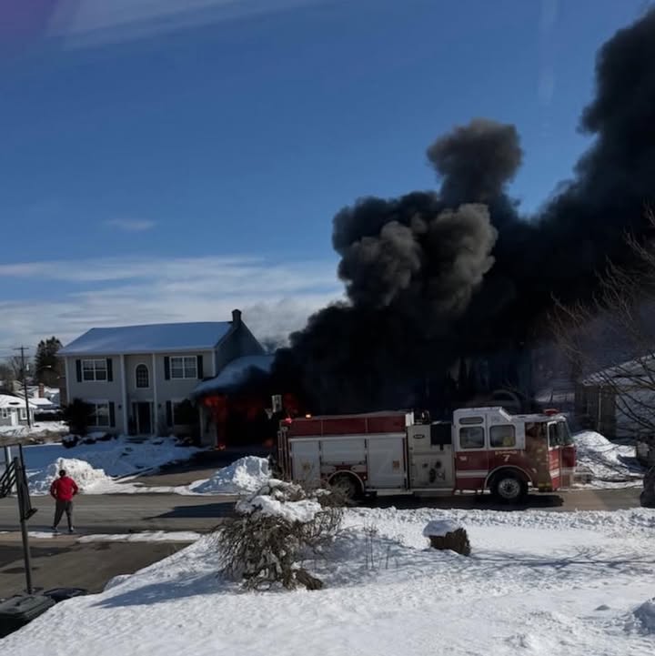Smoke billowing from a garage fire on Scotiaview Drive