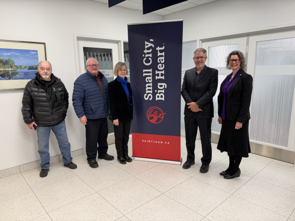 Graphic announcing the Bridge Housing Project advancement in Saint John