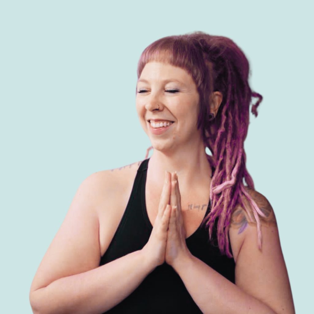 Sadie Webster practicing yoga outdoors