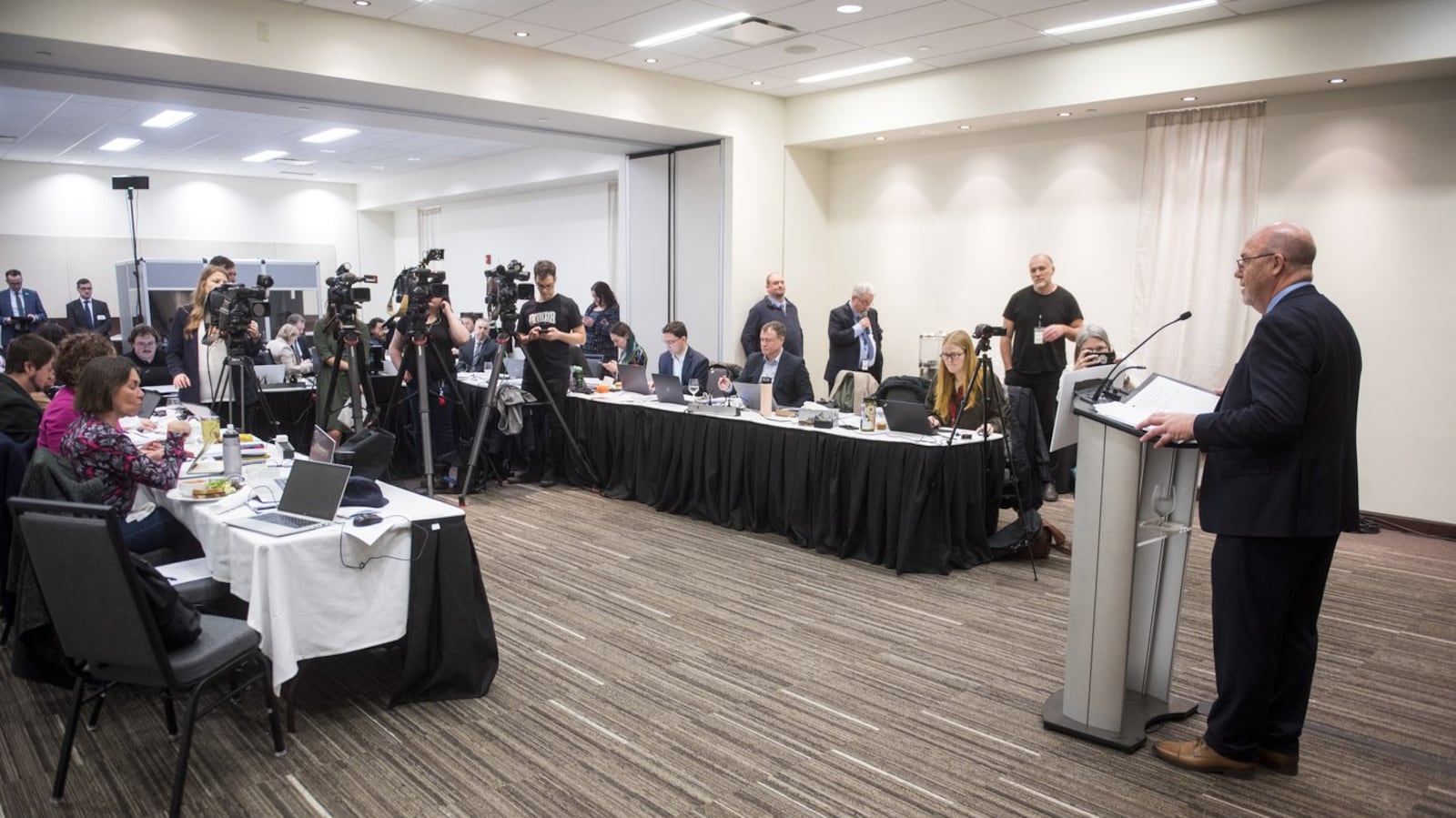New Brunswick Finance and Treasury Board Minister Rene Legacy speaks at a press conference