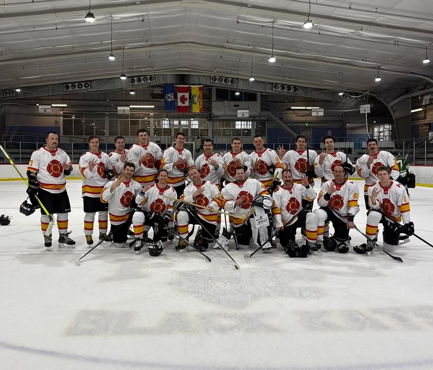 Saint John Firefighters on the ice during the Paws for Pucks Championship