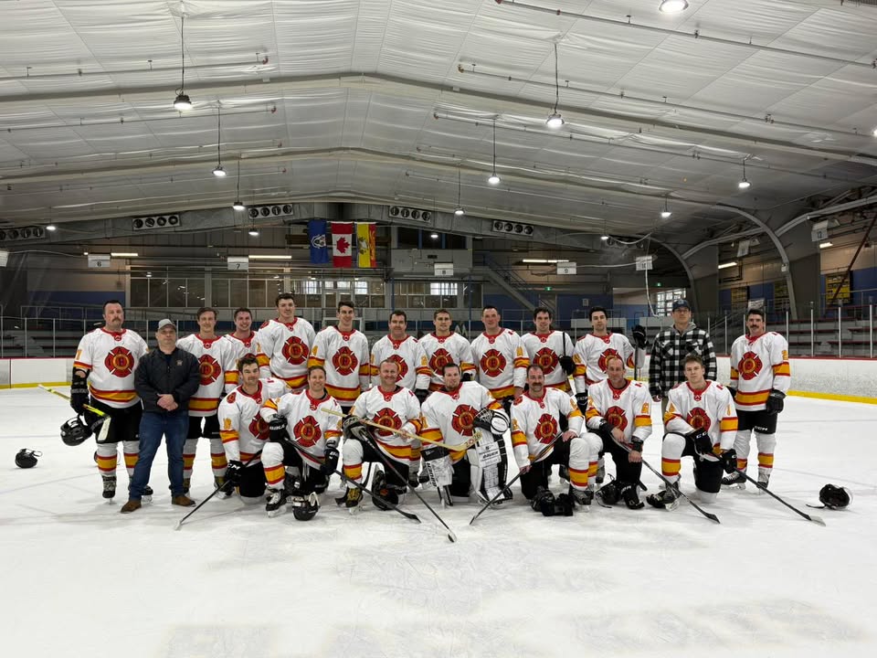 Saint John Firefighters Hockey Team celebrating their championship win