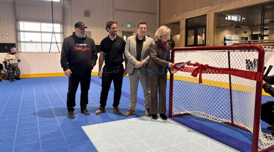 Saint John Mayor Donna Reardon cuts the ribbon to officially open the Knapper Center