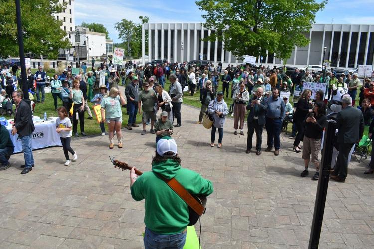 Protesters rally against planned government cuts to provincial veterinary services