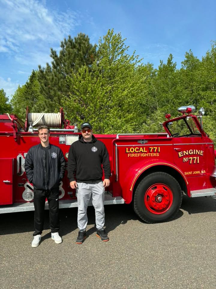 Saint John Firefighters at a community event