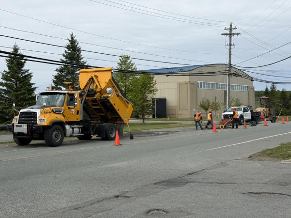 City workers repairing a pothole in Saint John