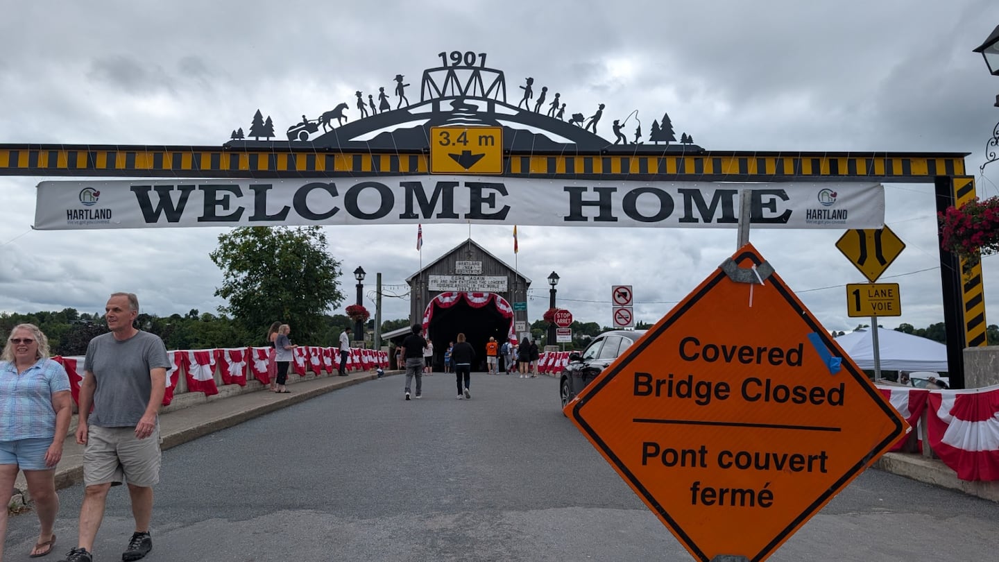 A new decorative archway placed in front of the Hartland Covered Bridge