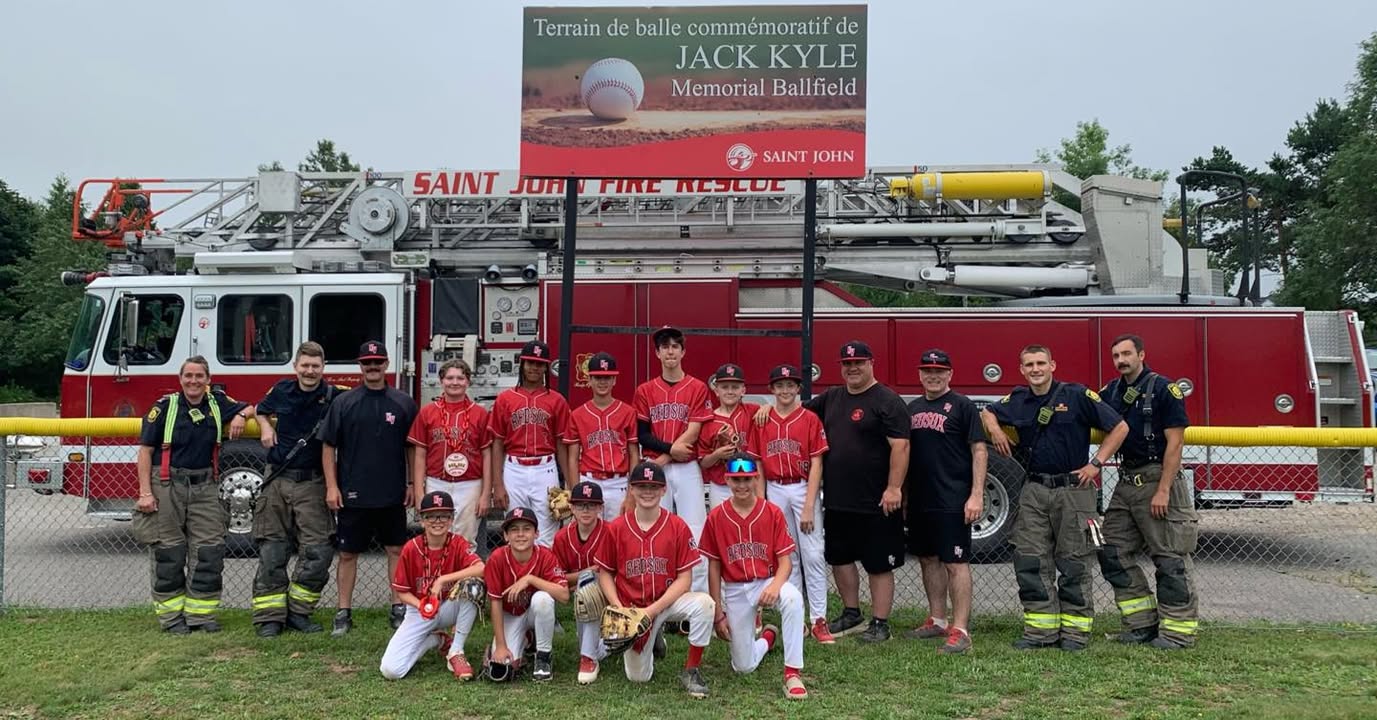 Saint John Firefighters coaching youth baseball