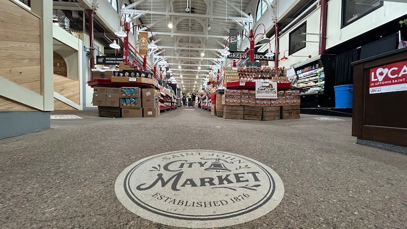 Saint John City Market logo on floor