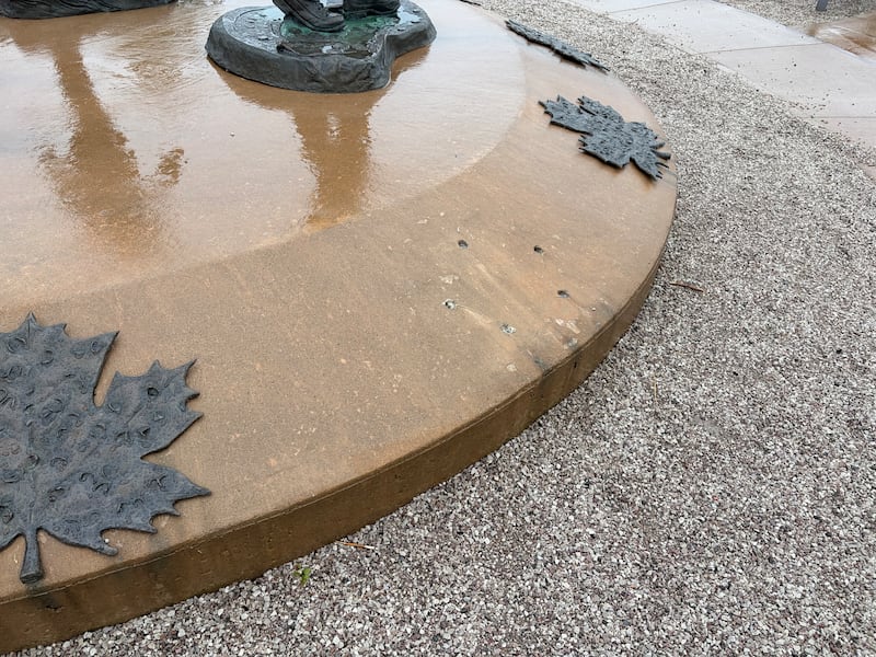The site of the missing bronze maple leaf at the Moncton RCMP memorial