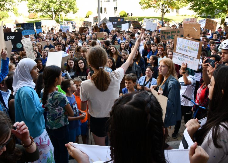 Students rallying at the New Brunswick Legislature to demand action on climate change in September 2019